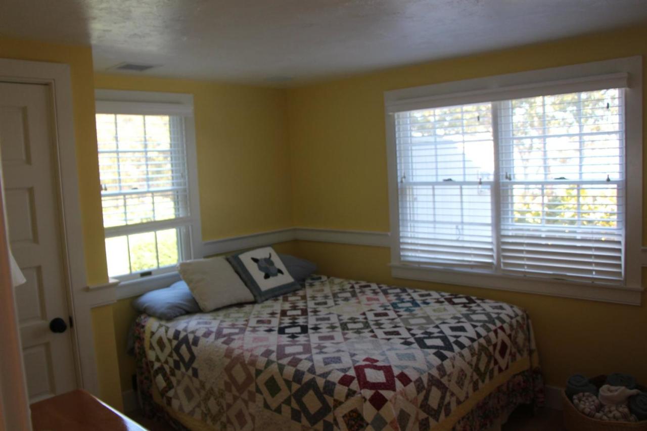 206 Clipper Road Bourne, MA 02532 - Photo 26 of 35 a bedroom with a bed and a window