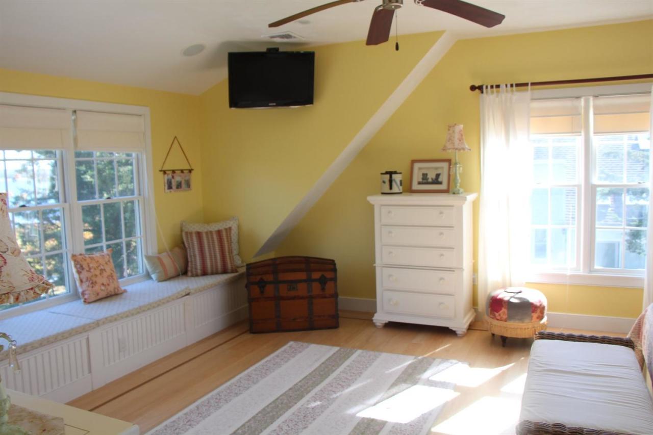 206 Clipper Road Bourne, MA 02532 - Photo 28 of 35 a living room with furniture and a flat screen tv
