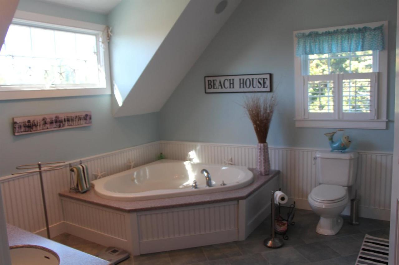 206 Clipper Road Bourne, MA 02532 - Photo 33 of 35 a bathroom with a sink and a toilet