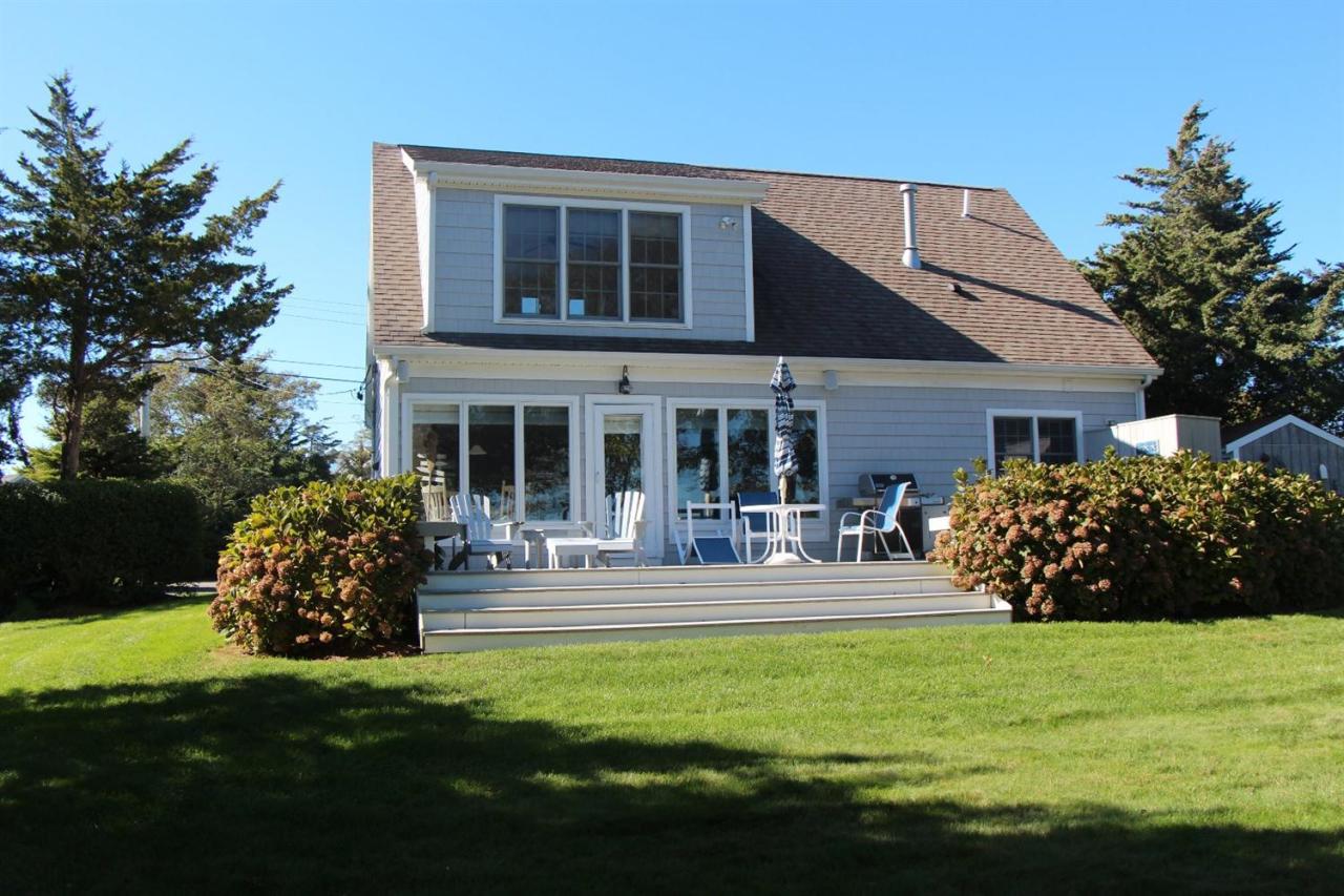 206 Clipper Road Bourne, MA 02532 - Photo 6 of 35 a house view with a garden space