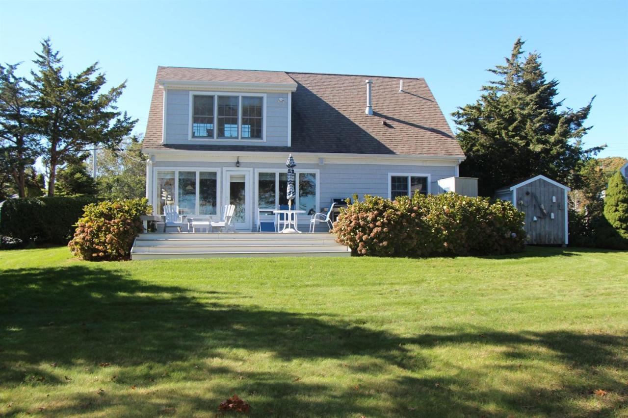 206 Clipper Road Bourne, MA 02532 - Photo 8 of 35 a front view of a house with garden