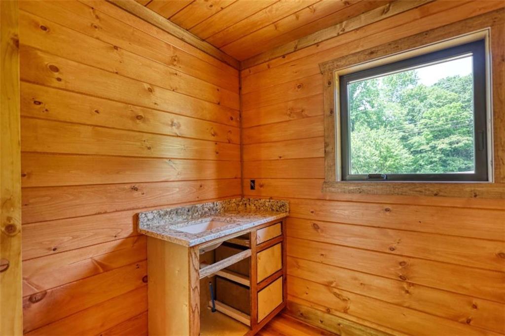 485 Church Street Blue Ridge, GA 30513 - Photo 26 of 85 a bathroom with a sink and a window