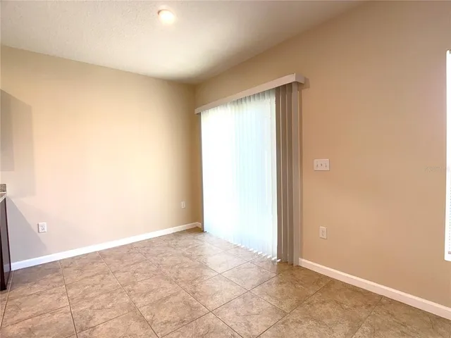 an empty room with an entryway