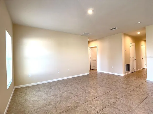 an empty room with a natural light