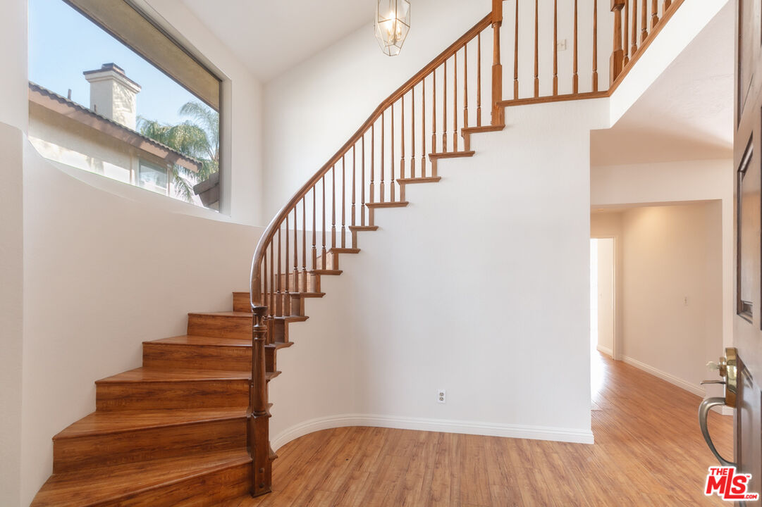 552 Fairfield Road Simi Valley, CA 93065 - Photo 7 of 13 a view of entryway and hall with wooden floor