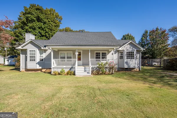 a view of a house with a swimming pool