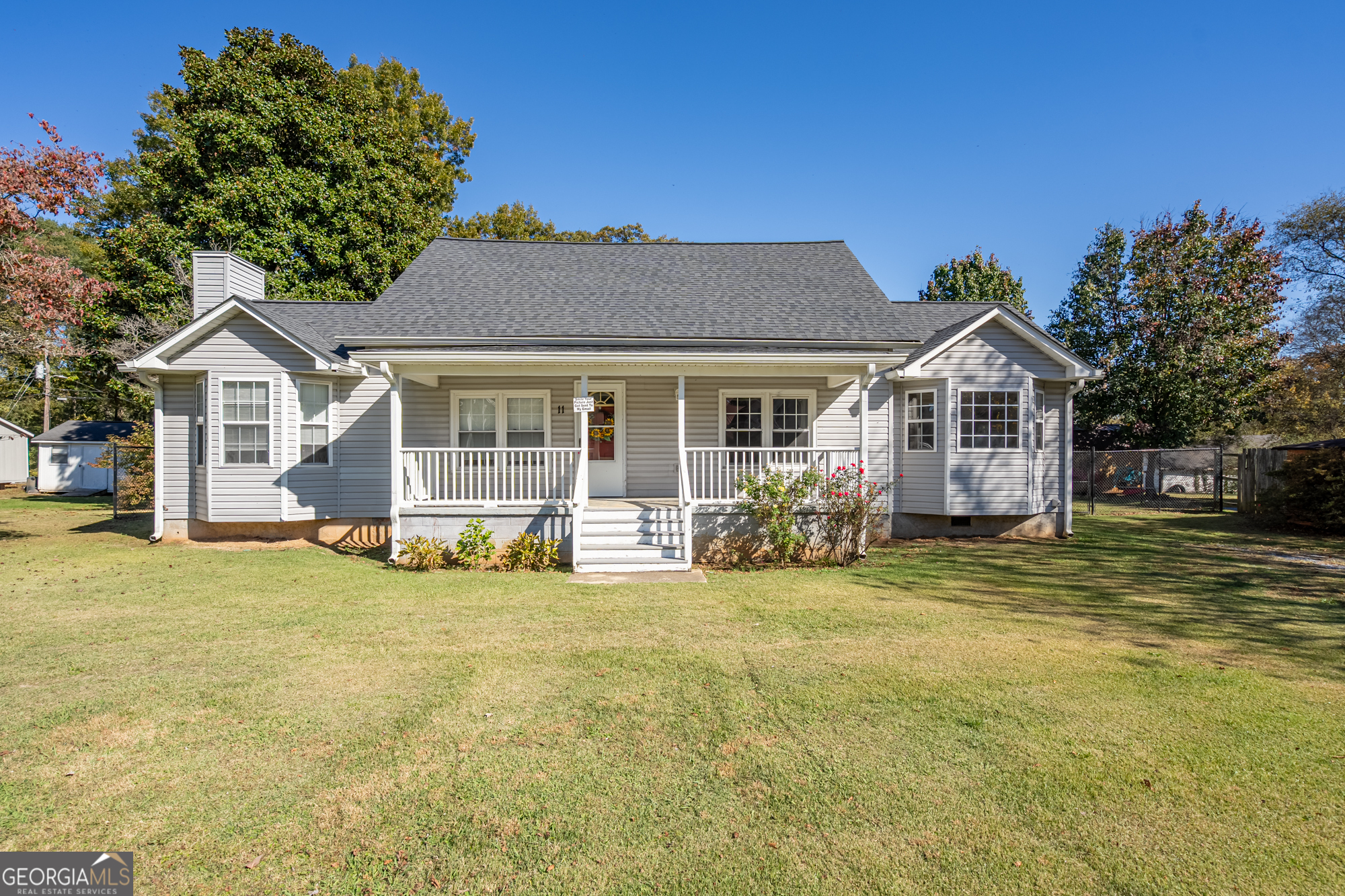 a view of a house with a swimming pool