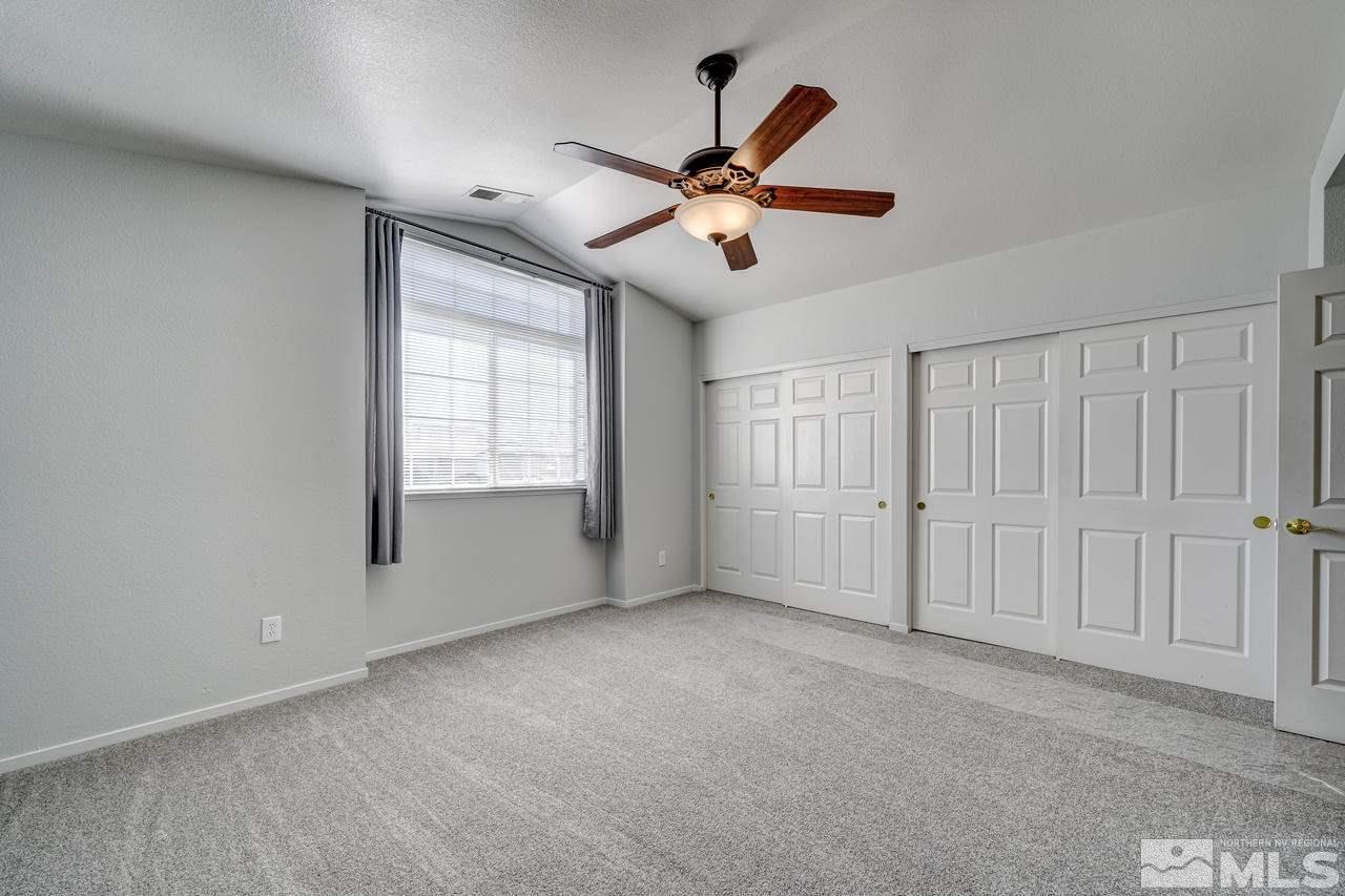 14435 Ghost Rider Drive Reno, NV 89511 - Photo 22 of 30 a view of an empty room with a window