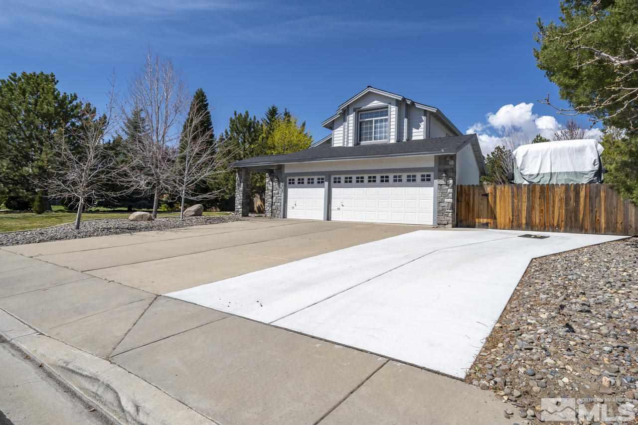 14435 Ghost Rider Drive Reno, NV 89511 - Photo 27 of 30 a front view of a house with a outdoor space