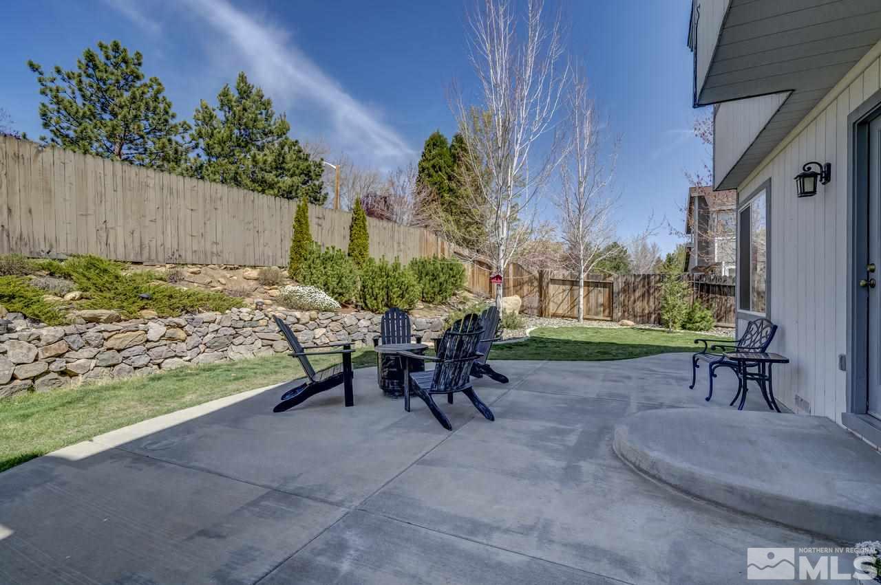 14435 Ghost Rider Drive Reno, NV 89511 - Photo 28 of 30 a view of a bench in a yard