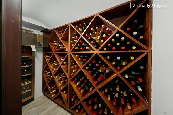 a roof deck with table and chairs