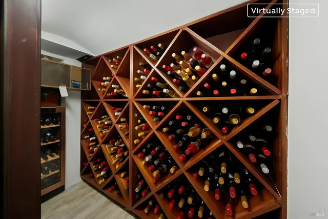 a roof deck with table and chairs