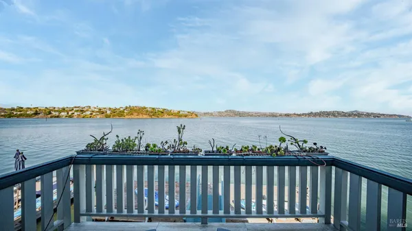 a kitchen with stainless steel appliances a refrigerator and a stove