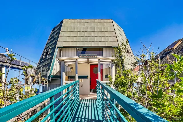 a view of a balcony with chairs