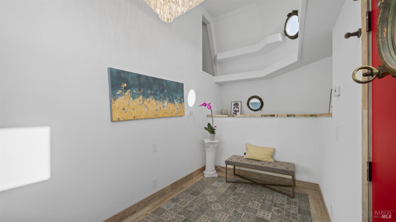 68 Issaquah Dock Sausalito, CA 94965 - Photo 31 of 81 a view of a hallway with paintings on the wall