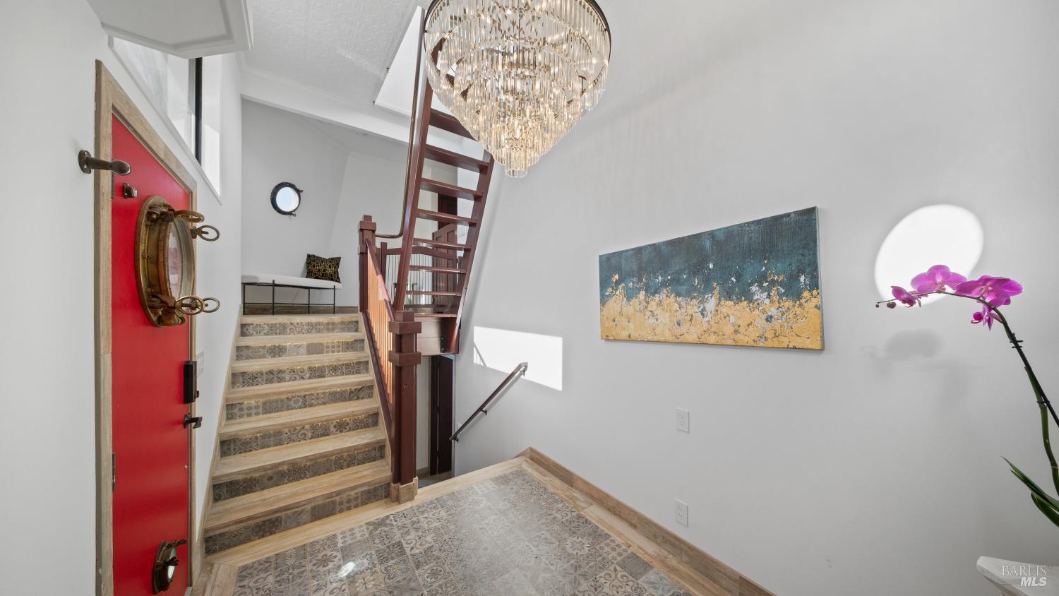 68 Issaquah Dock Sausalito, CA 94965 - Photo 32 of 81 a view of a hallway with paintings on the wall