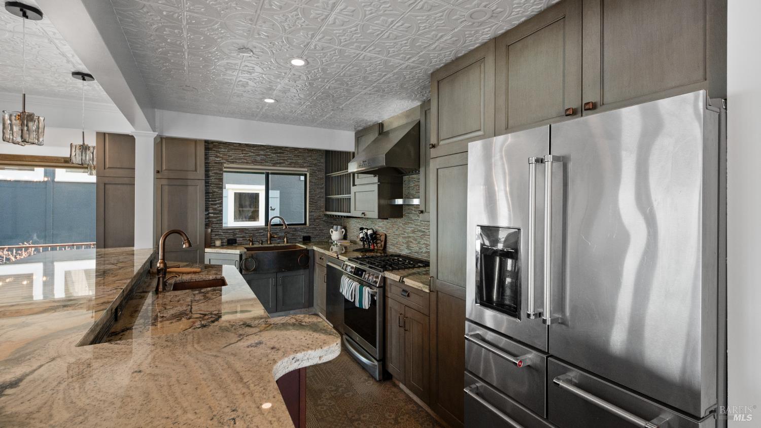 68 Issaquah Dock Sausalito, CA 94965 - Photo 35 of 81 a kitchen with stainless steel appliances a refrigerator and a stove