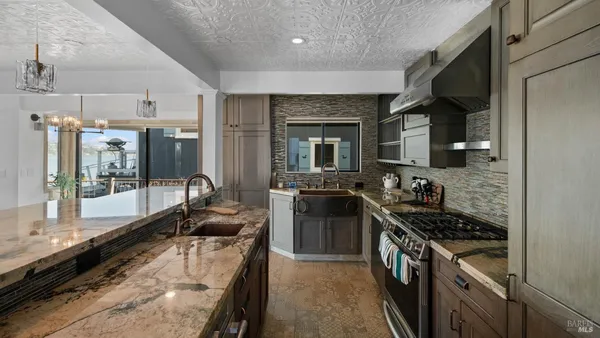 a view of a hallway with wooden floor and stairs