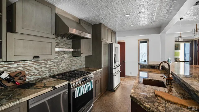 a bedroom with a bed and a television