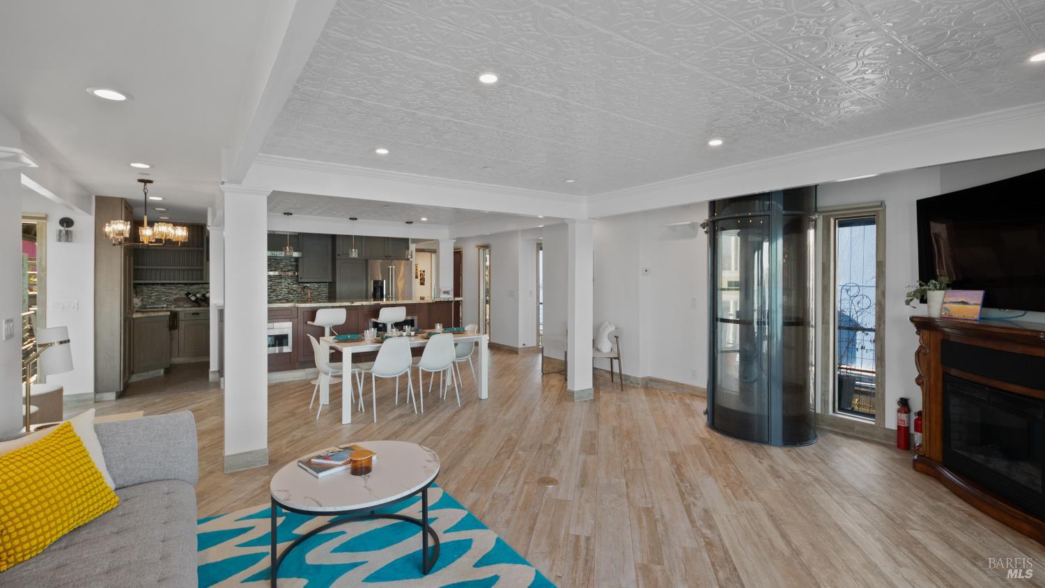 68 Issaquah Dock Sausalito, CA 94965 - Photo 42 of 81 a view of a dining room with furniture a rug and wooden floor