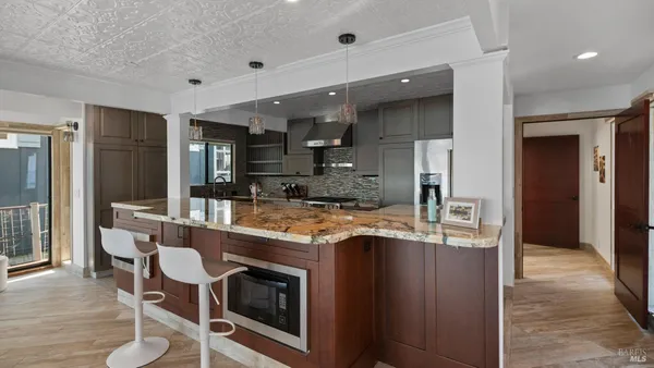 a view of a swimming pool with chairs