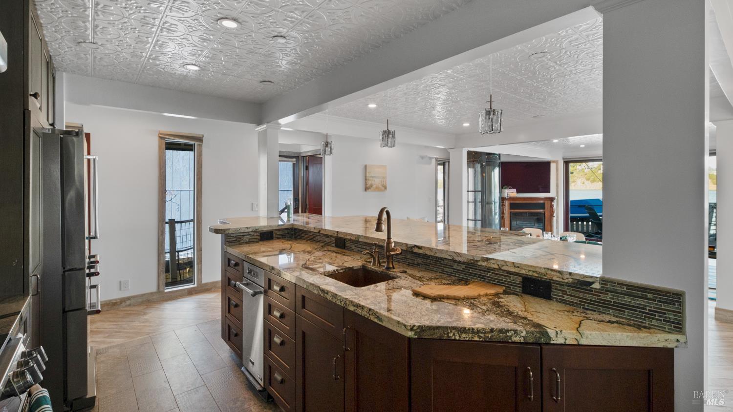 68 Issaquah Dock Sausalito, CA 94965 - Photo 47 of 81 a kitchen with stainless steel appliances granite countertop stove a sink and a refrigerator
