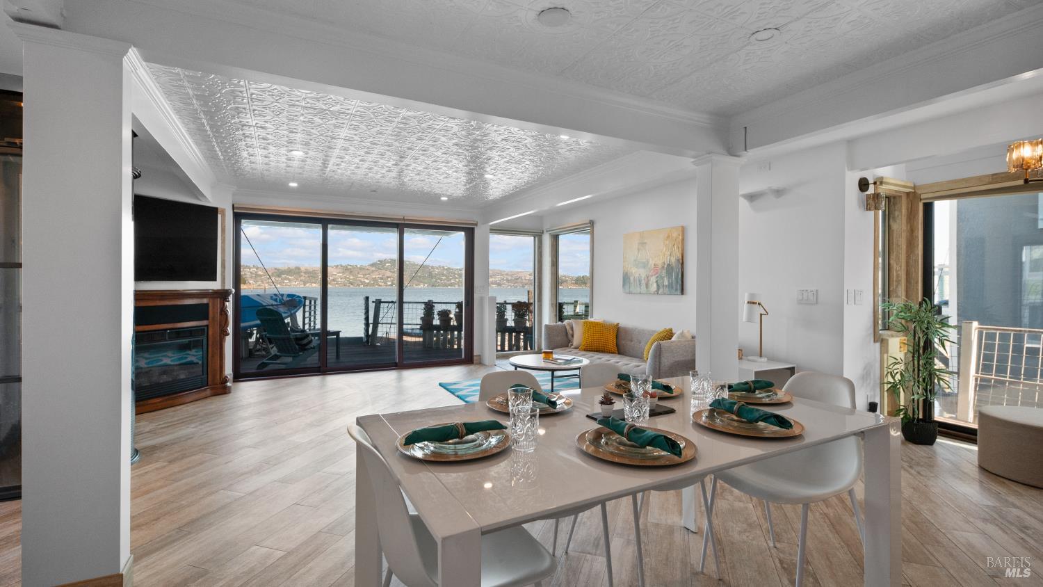 68 Issaquah Dock Sausalito, CA 94965 - Photo 5 of 81 a view of a dining room with furniture wooden floor and chandelier