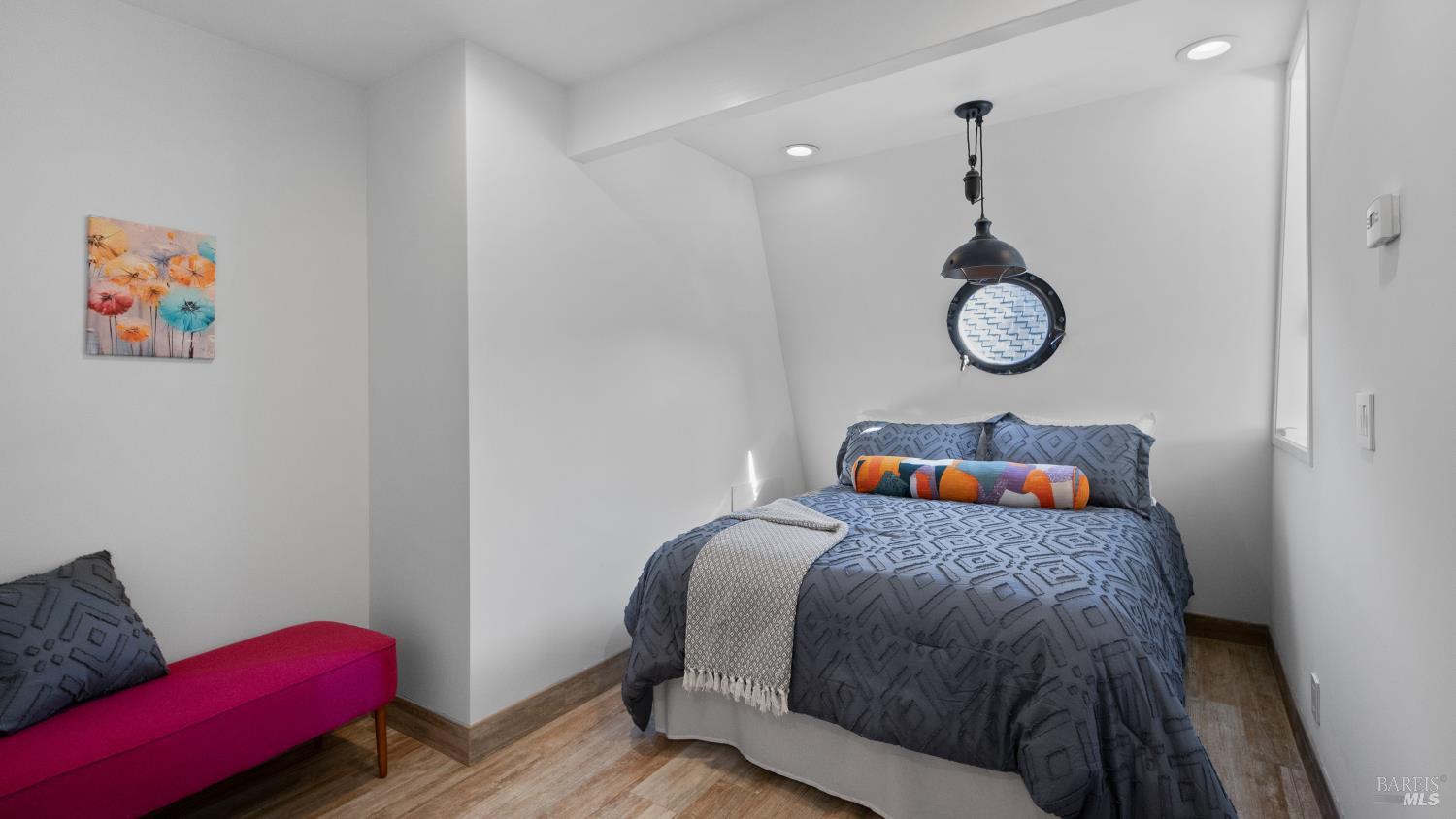 68 Issaquah Dock Sausalito, CA 94965 - Photo 52 of 81 a bedroom with a bed and a window