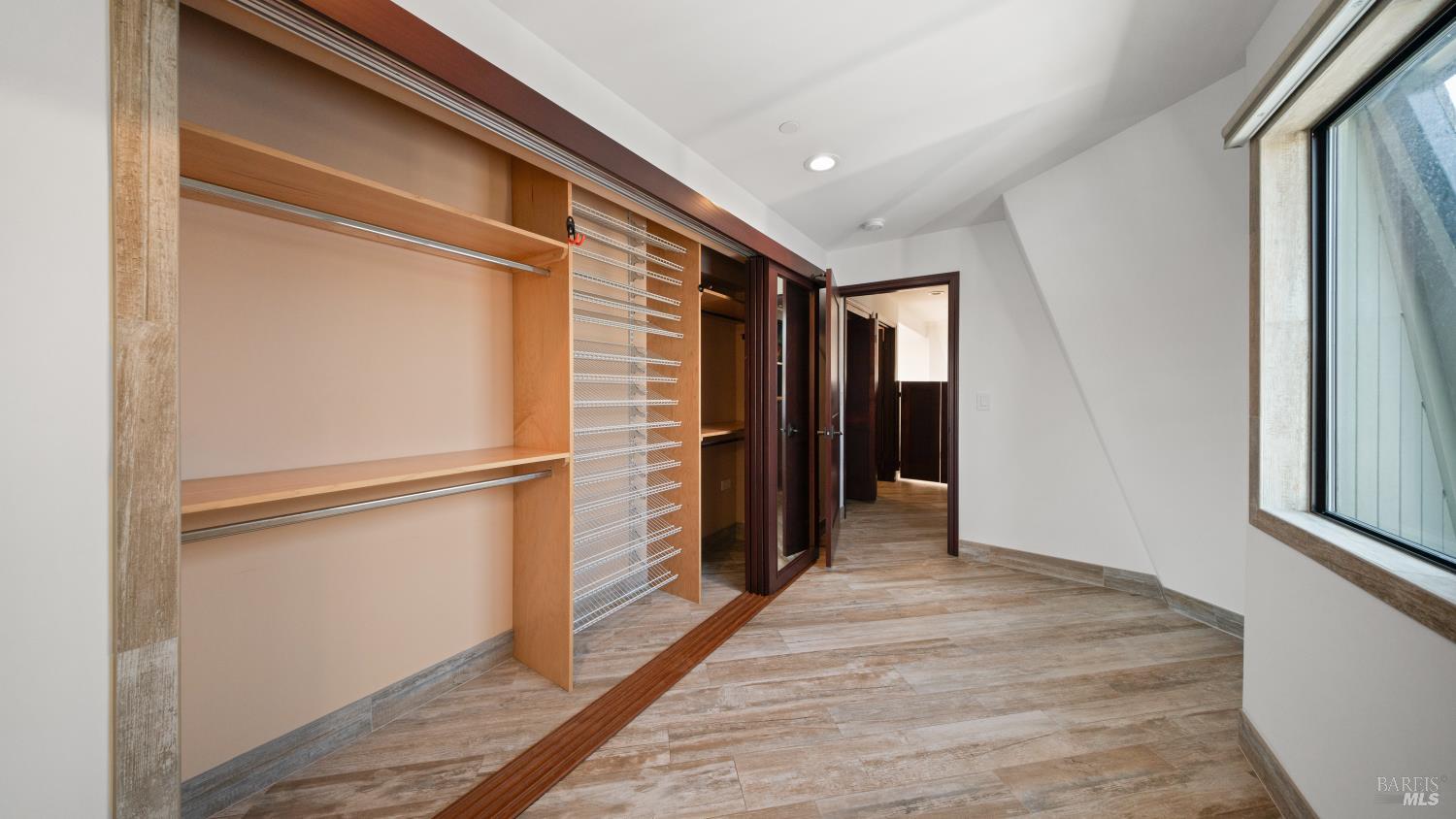 68 Issaquah Dock Sausalito, CA 94965 - Photo 55 of 81 a view of a hallway with wooden floor and closet