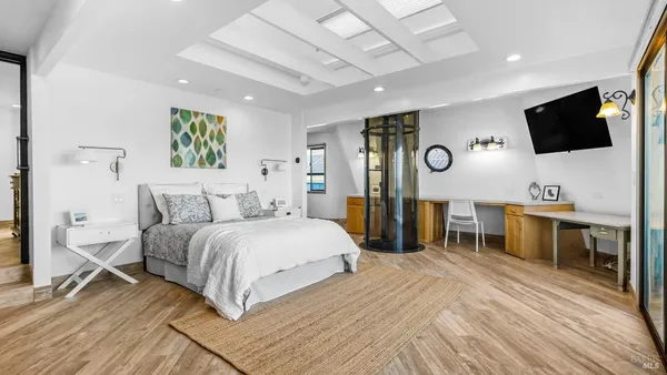 a white toilet sitting next to a bathroom sink