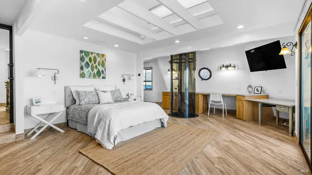 a white toilet sitting next to a bathroom sink