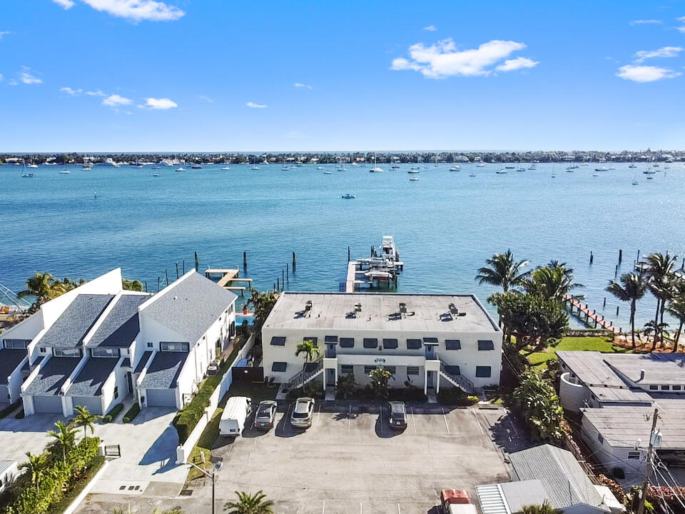 300 53rd Street, Unit 7 West Palm Beach, FL 33407 - Photo 16 of 24 a terrace with outdoor seating and city view
