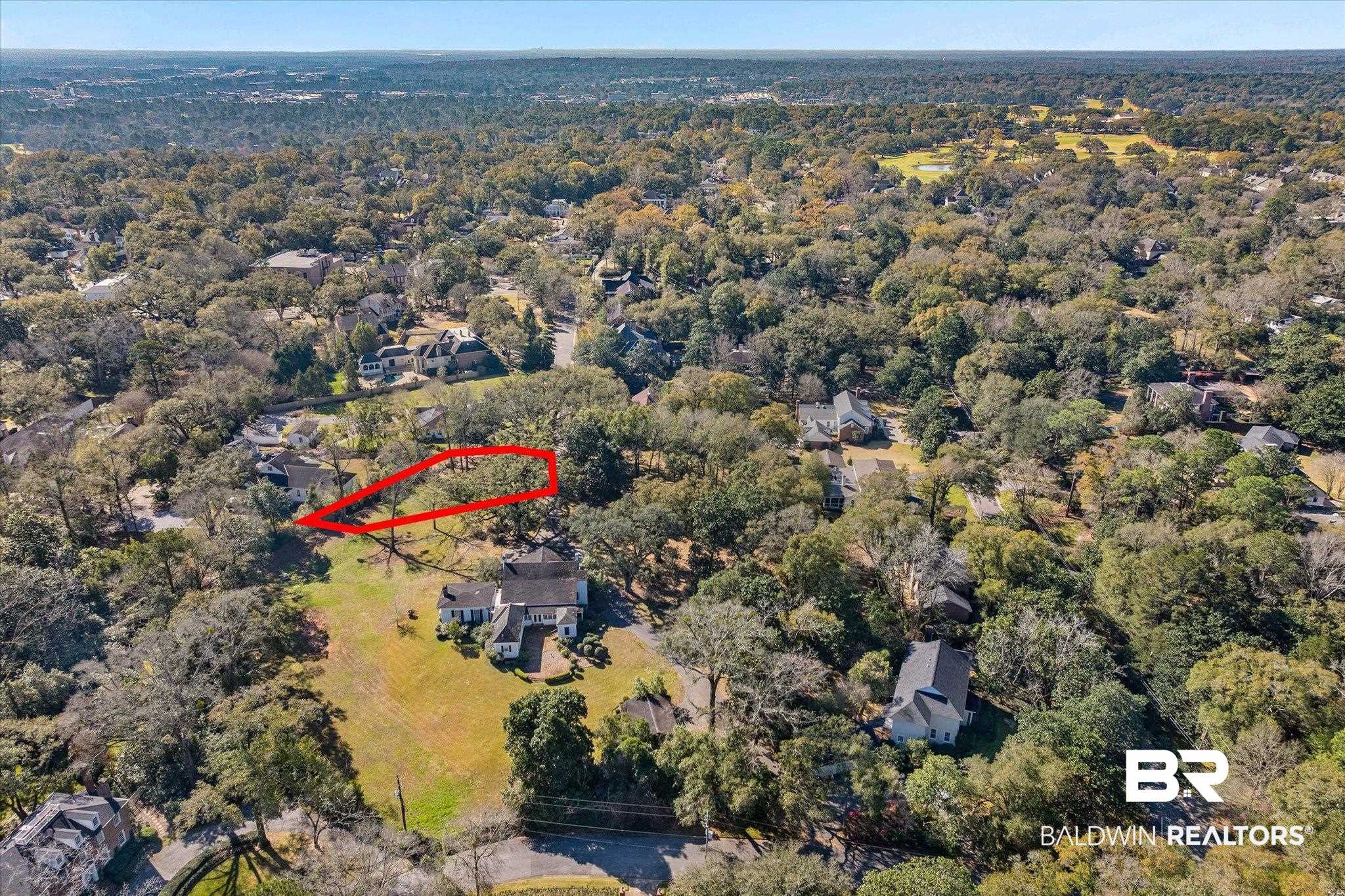 0 Austill Place Mobile, AL 36608 - Photo 4 of 14 Aerial view of property and surrounding area with a heavily wooded area and property boundaries highlighted