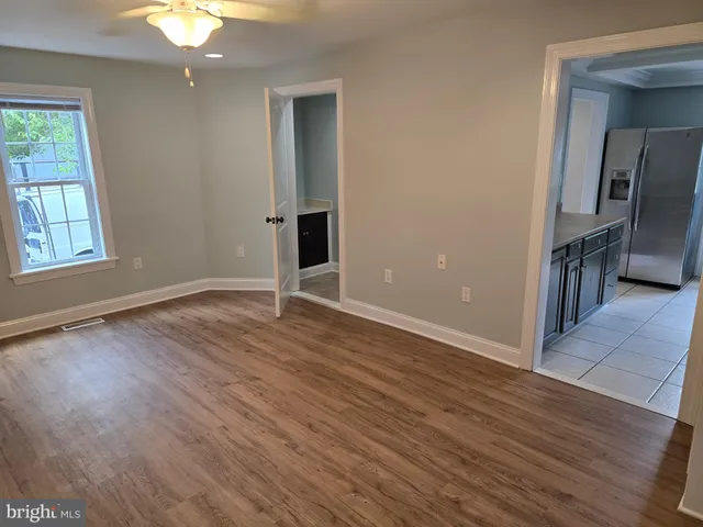 a view of entryway with wooden floor