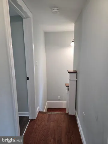 a view of livingroom with hardwood floor and a ceiling fan