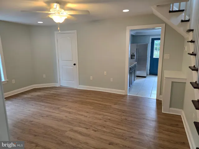 a kitchen with a refrigerator and countertop