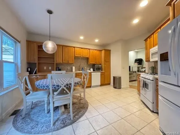 a view of a dining room kitchen and a window