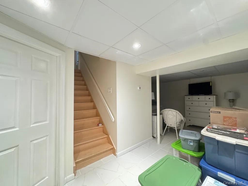 103 Sunflower Ridge Road Centereach, NY 11720 - Photo 6 of 16 a workspace with furniture and a window