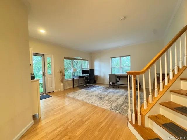 103 Sunflower Ridge Road Centereach, NY 11720 - Photo 10 of 16 a view of a livingroom with wooden floor and furniture