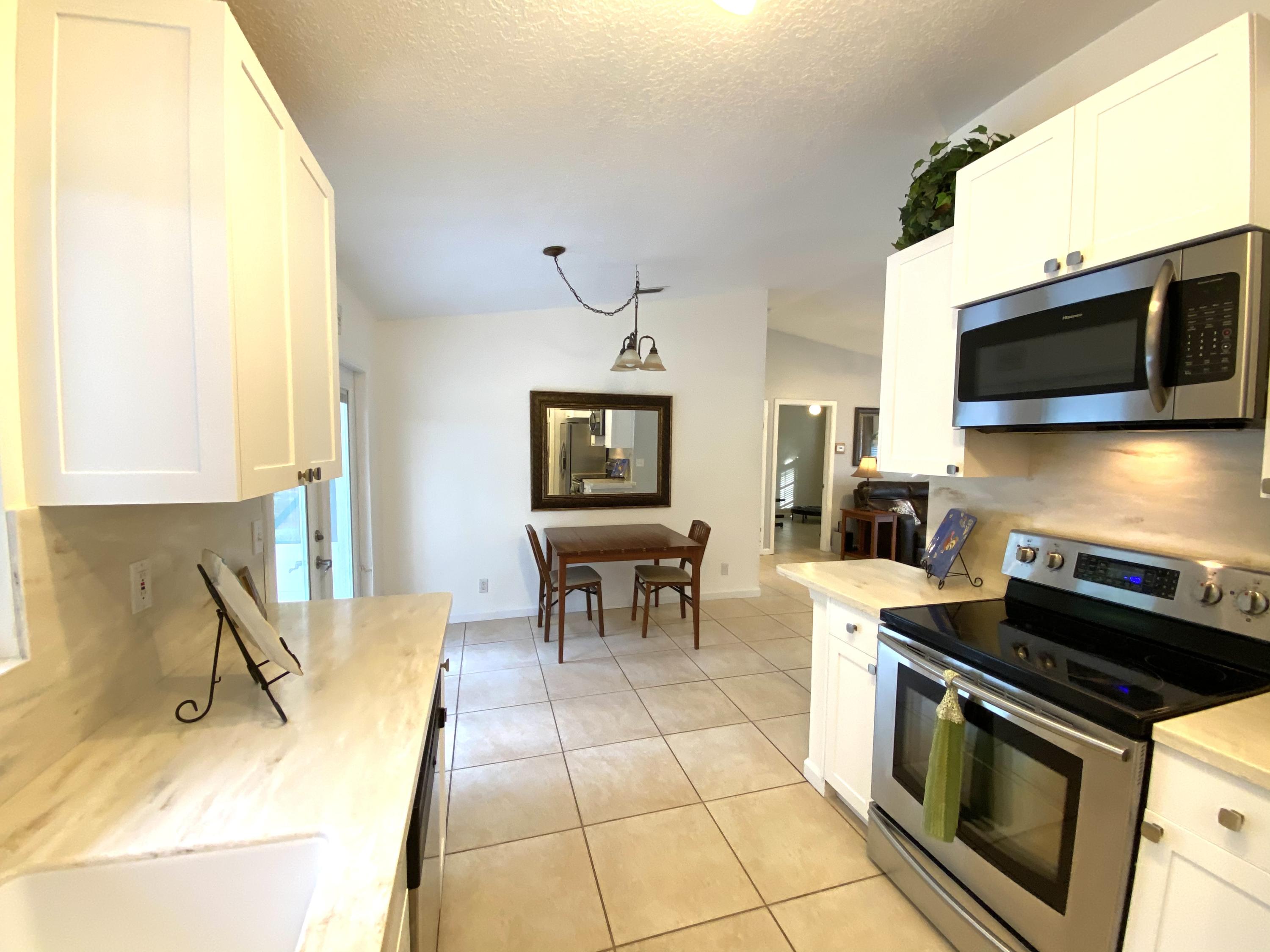 14705 76th Road North Loxahatchee, FL 33470 - Photo 9 of 99 49747A84-C5F5-44A1-A79F-4664E608BE46
