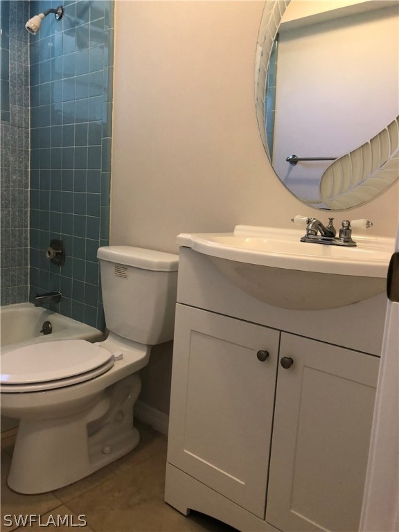 19 Connecticut Road Lehigh Acres, FL 33936 - Photo 12 of 26 a bathroom with a toilet and a sink
