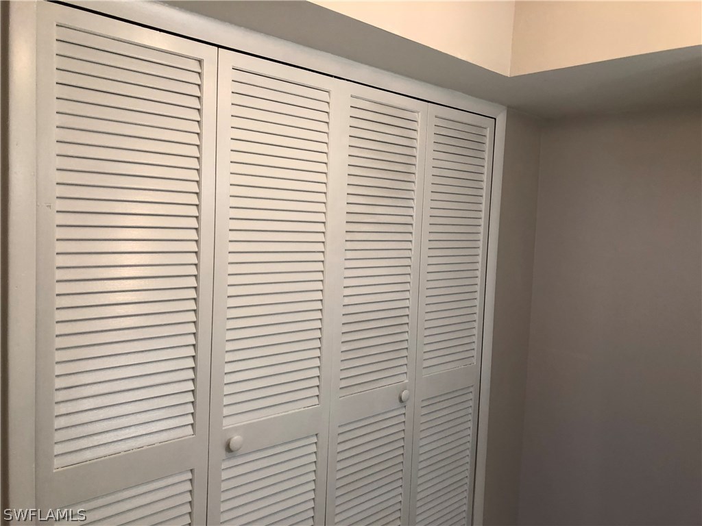 19 Connecticut Road Lehigh Acres, FL 33936 - Photo 19 of 26 a view of a room that has a window