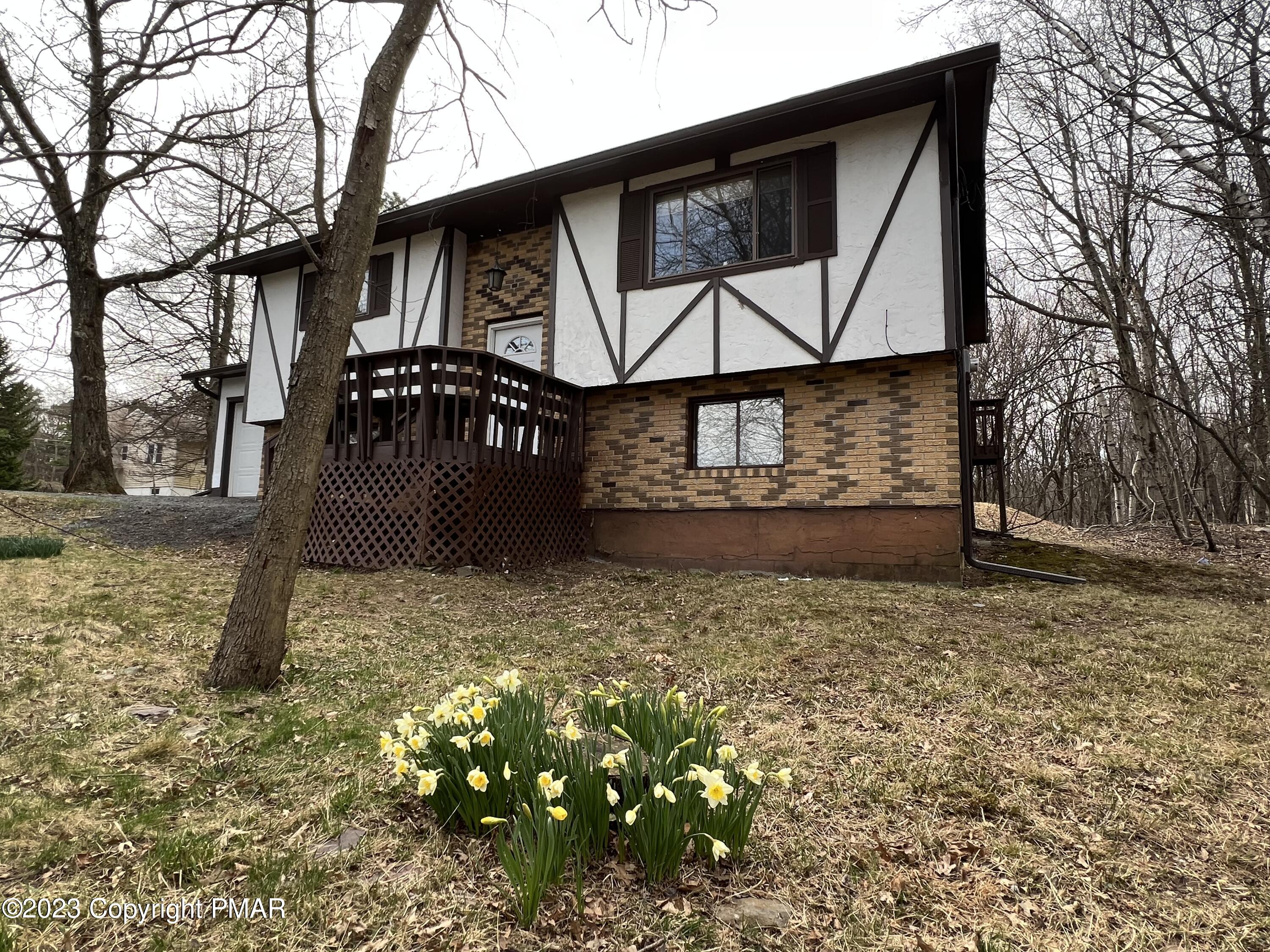 143 Granite Road Long Pond, PA 18334 - Photo 23 of 23 a view of a house with a yard