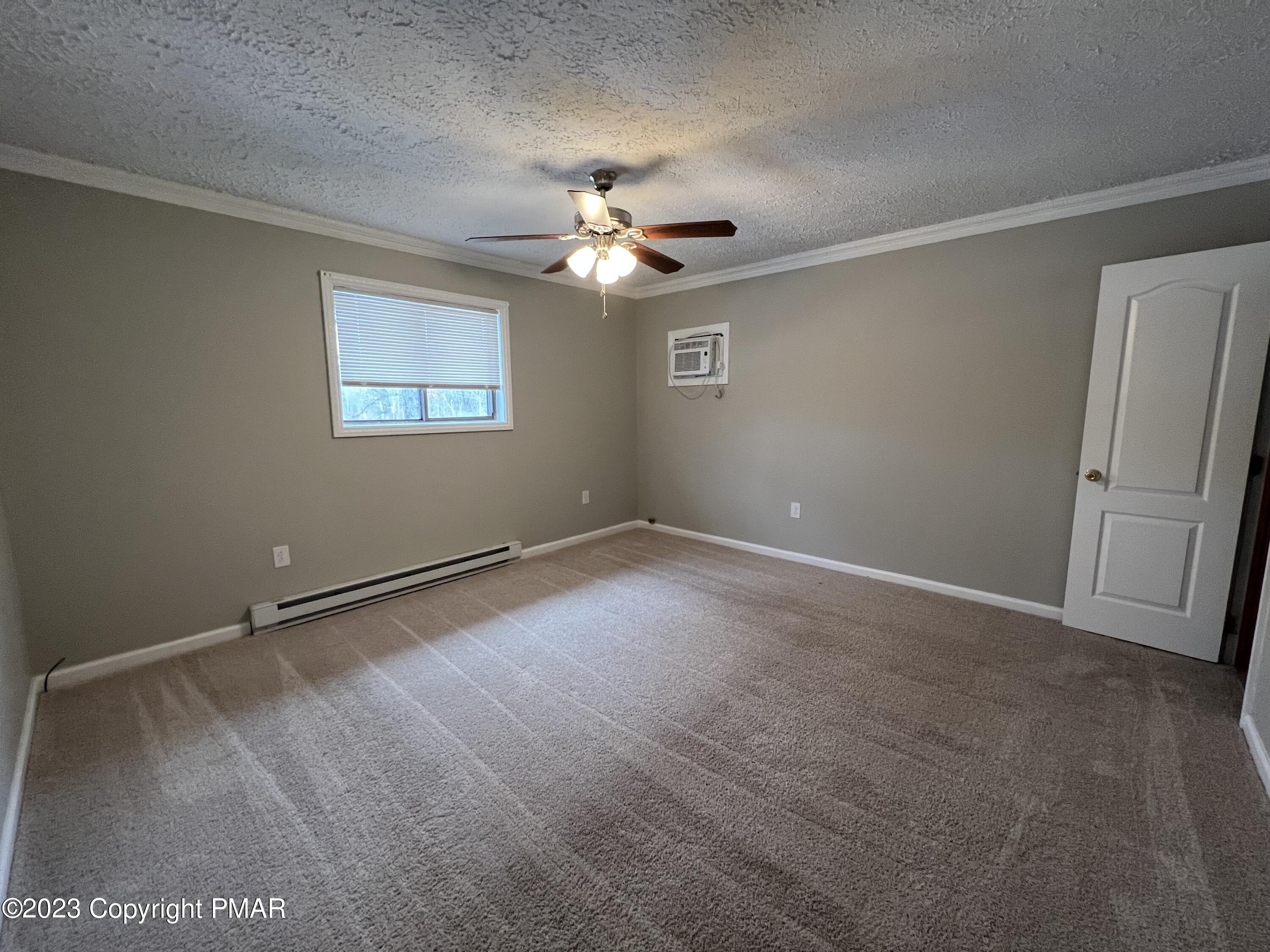 143 Granite Road Long Pond, PA 18334 - Photo 5 of 23 a view of an empty room with a window