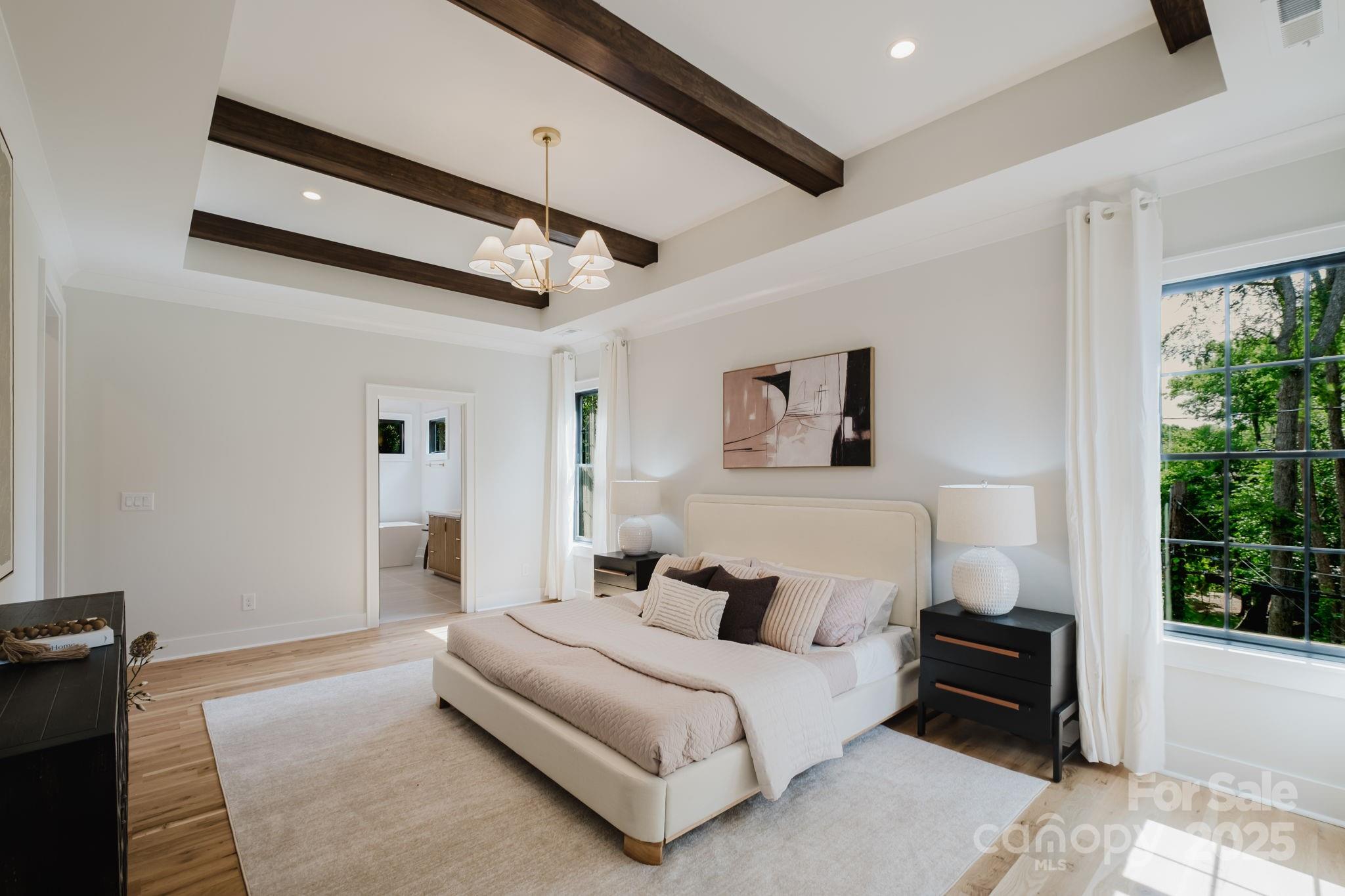 1625 Club Road Charlotte, NC 28205 - Photo 15 of 31 a spacious bedroom with a bed and a window