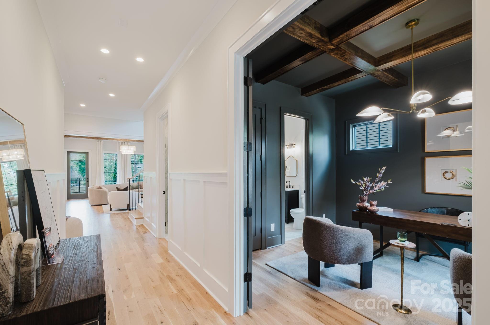 1625 Club Road Charlotte, NC 28205 - Photo 3 of 31 a living room with furniture and a flat screen tv