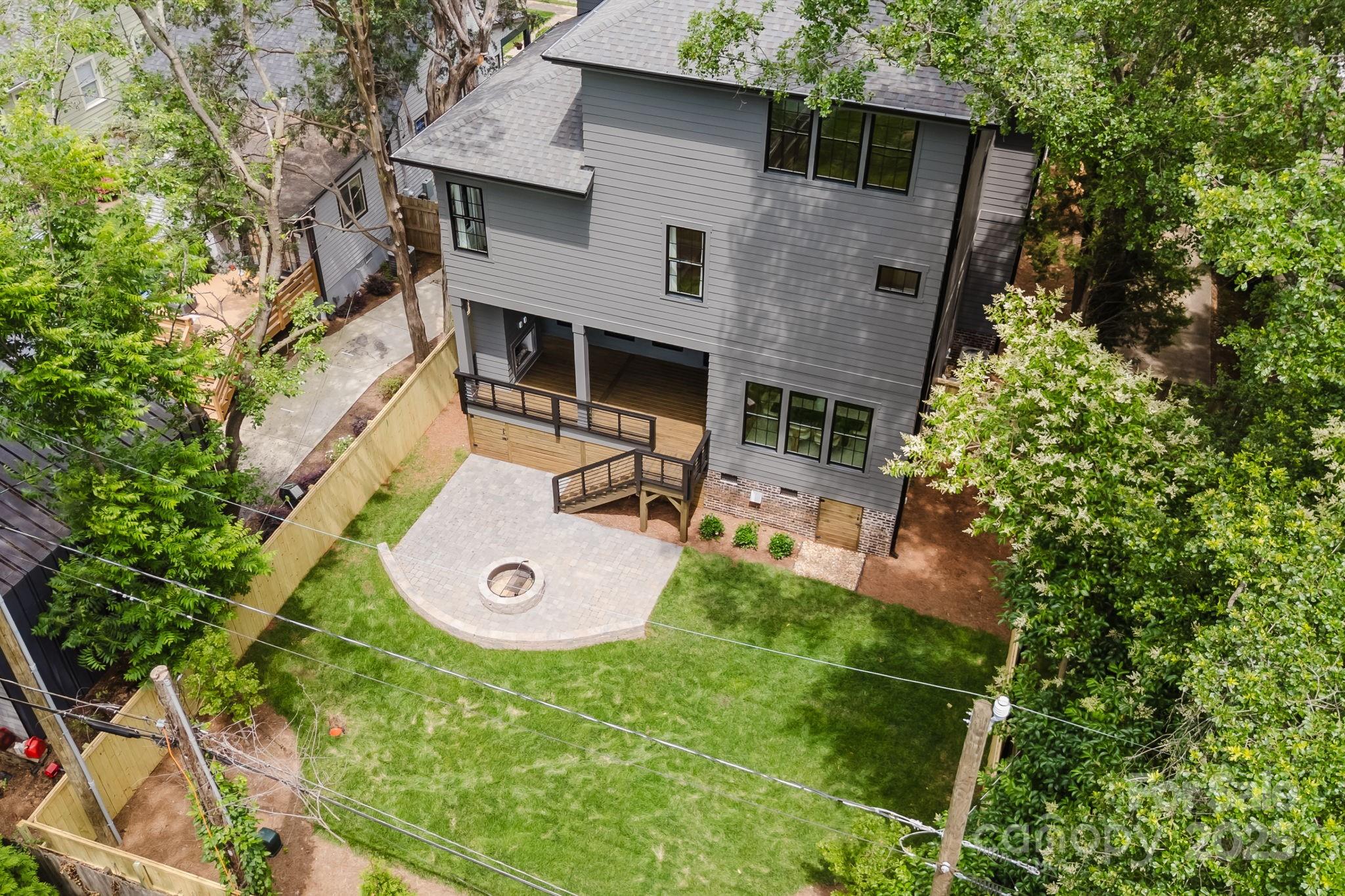 1625 Club Road Charlotte, NC 28205 - Photo 31 of 31 a view of a house with backyard and sitting area