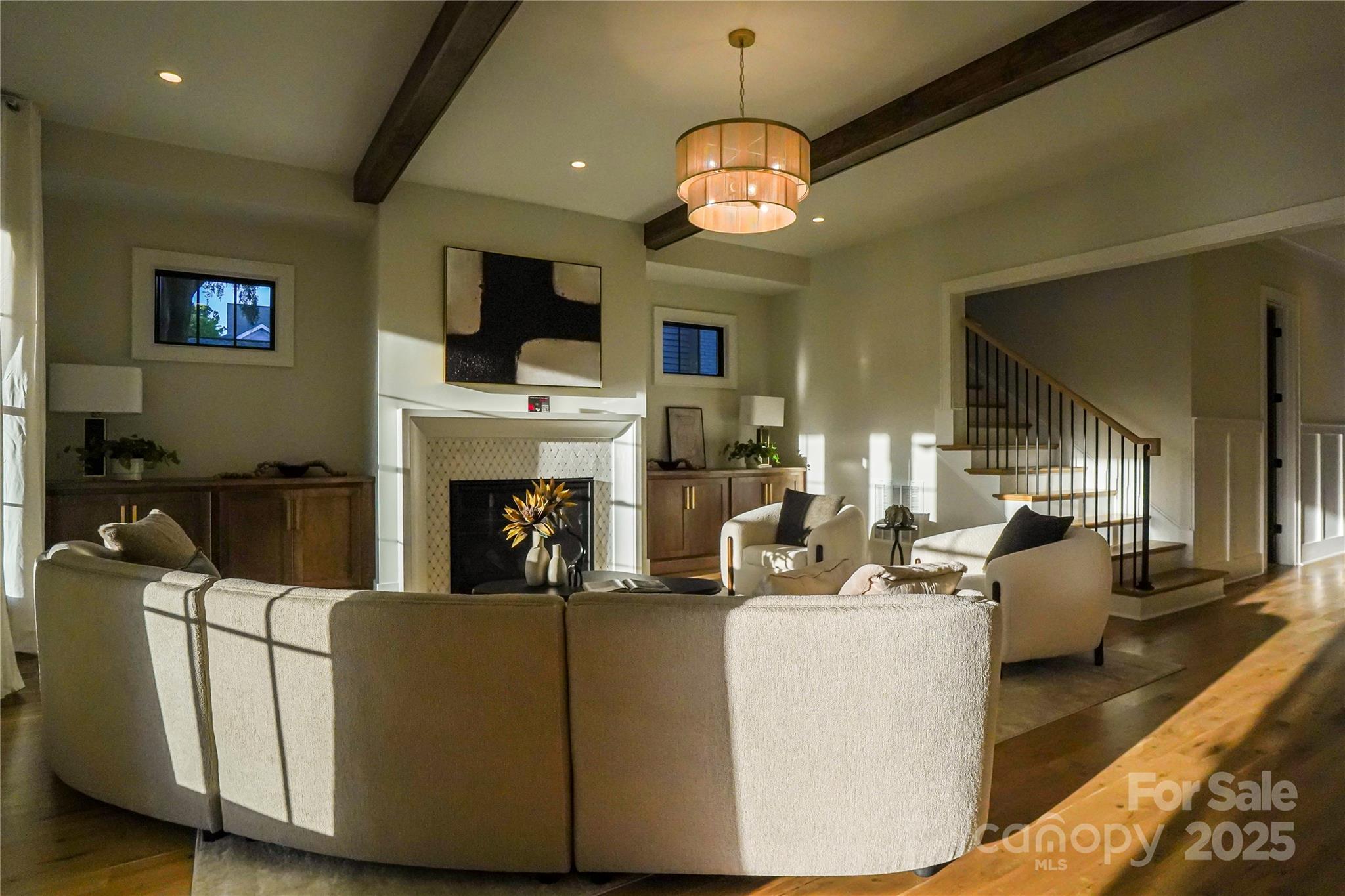 1625 Club Road Charlotte, NC 28205 - Photo 9 of 31 a living room with fireplace furniture and a flat screen tv