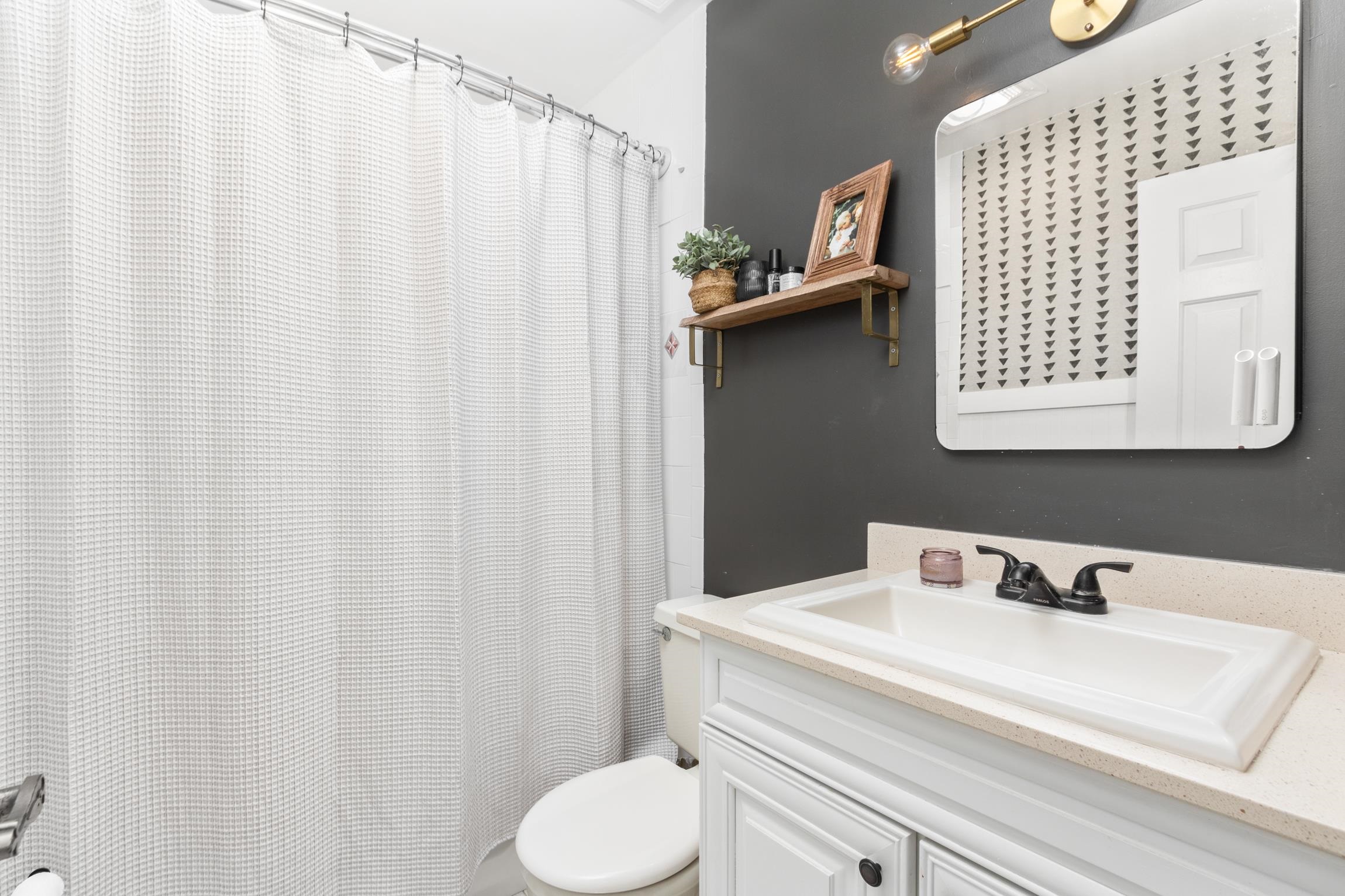 359 Shamrock Road St. Augustine, FL 32086 - Photo 21 of 39 a bathroom with a sink and a toilet