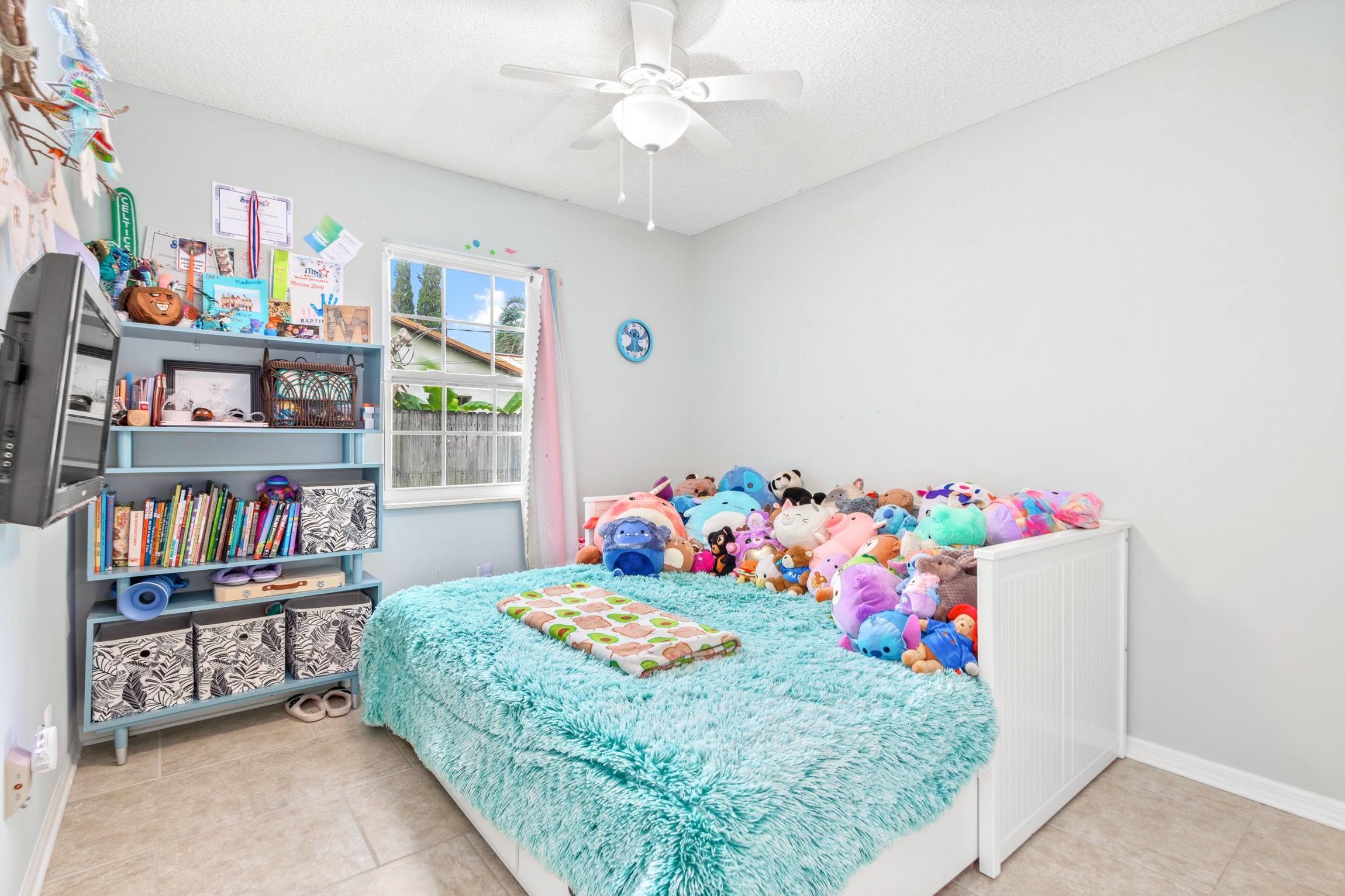 359 Shamrock Road St. Augustine, FL 32086 - Photo 22 of 39 a bedroom with furniture and book shelf